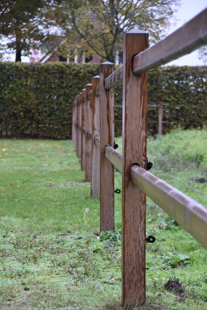 Premium closeboard wooden fence paneling in British garden
